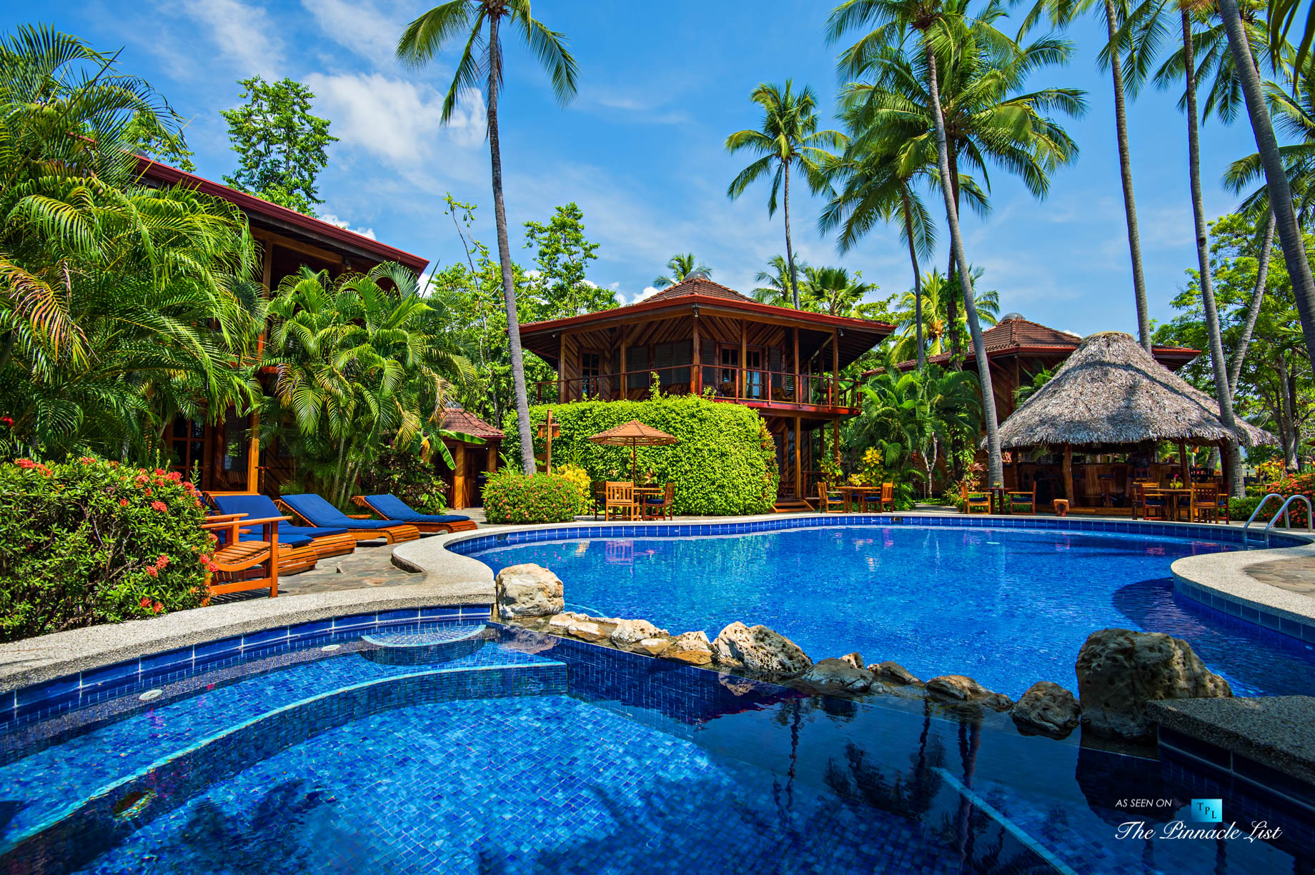 Pool and tropical landscaping at Tambor Tropical Beach Resort in Costa Rica